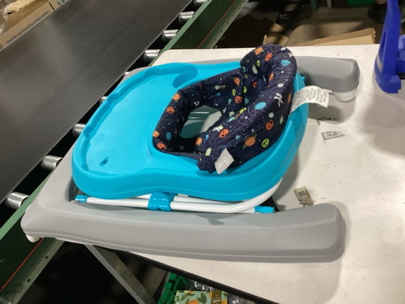 Condition photo showing New/Like New for smart steps trend activity walker and entertainer with removeable toys, large tray, cup holder, adjustable height and flat fold frame for storage, ages 6 months +, space walk navy