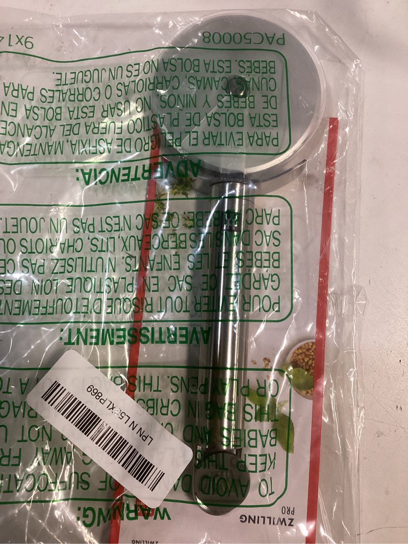 Condition photo showing New/Like New for ZWILLING Pro Pizza Cutter