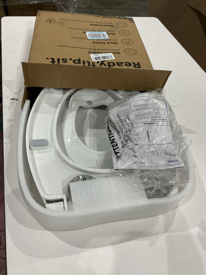Condition photo showing Good Condition for similar quick flip toilet seat with built-in potty & splash guard for toddler training, slow close - jool baby (elongated)