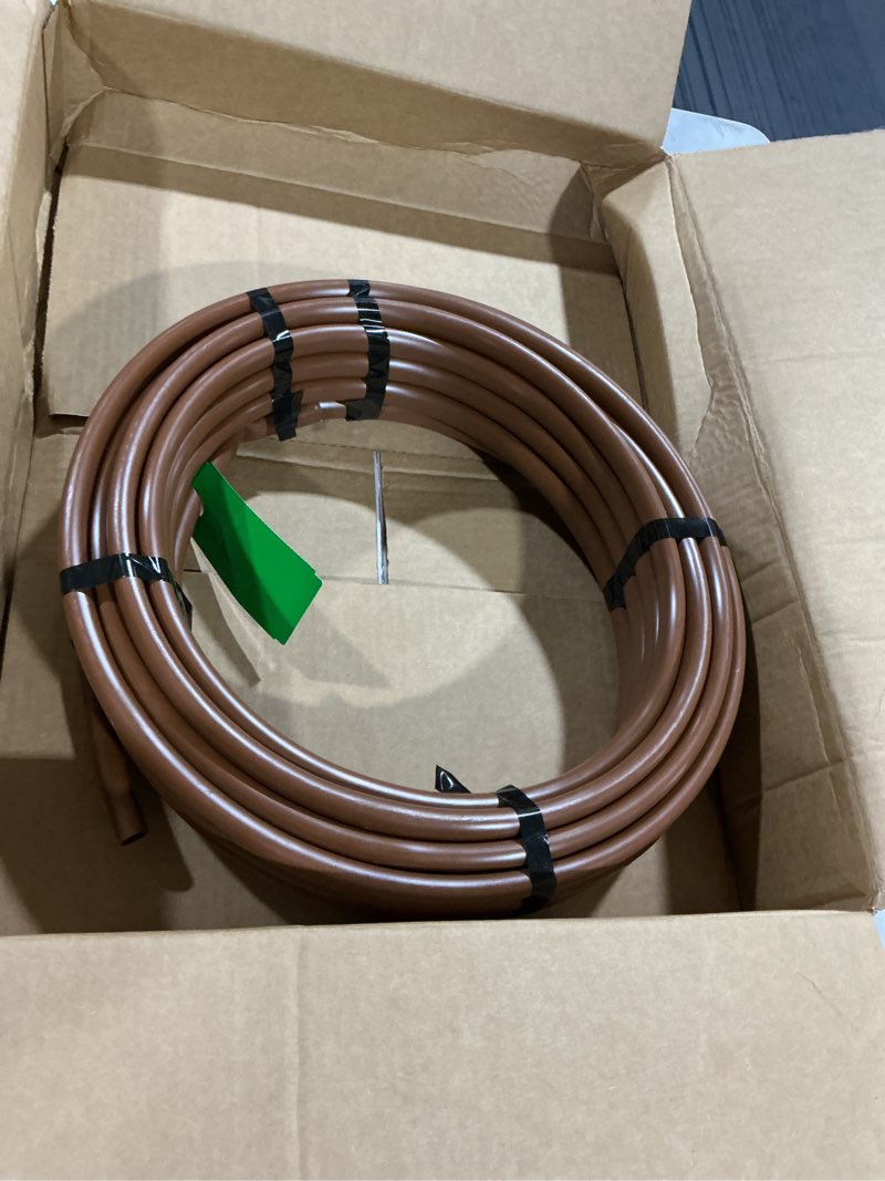 Condition photo showing Good Condition for raindrip r292dp 1/2-inch drip-a-long dripline with 1 gph pressure compensating emitters, 18-inch spacing, 50-foot, for drip irrigation and drip irrigation systems, black
