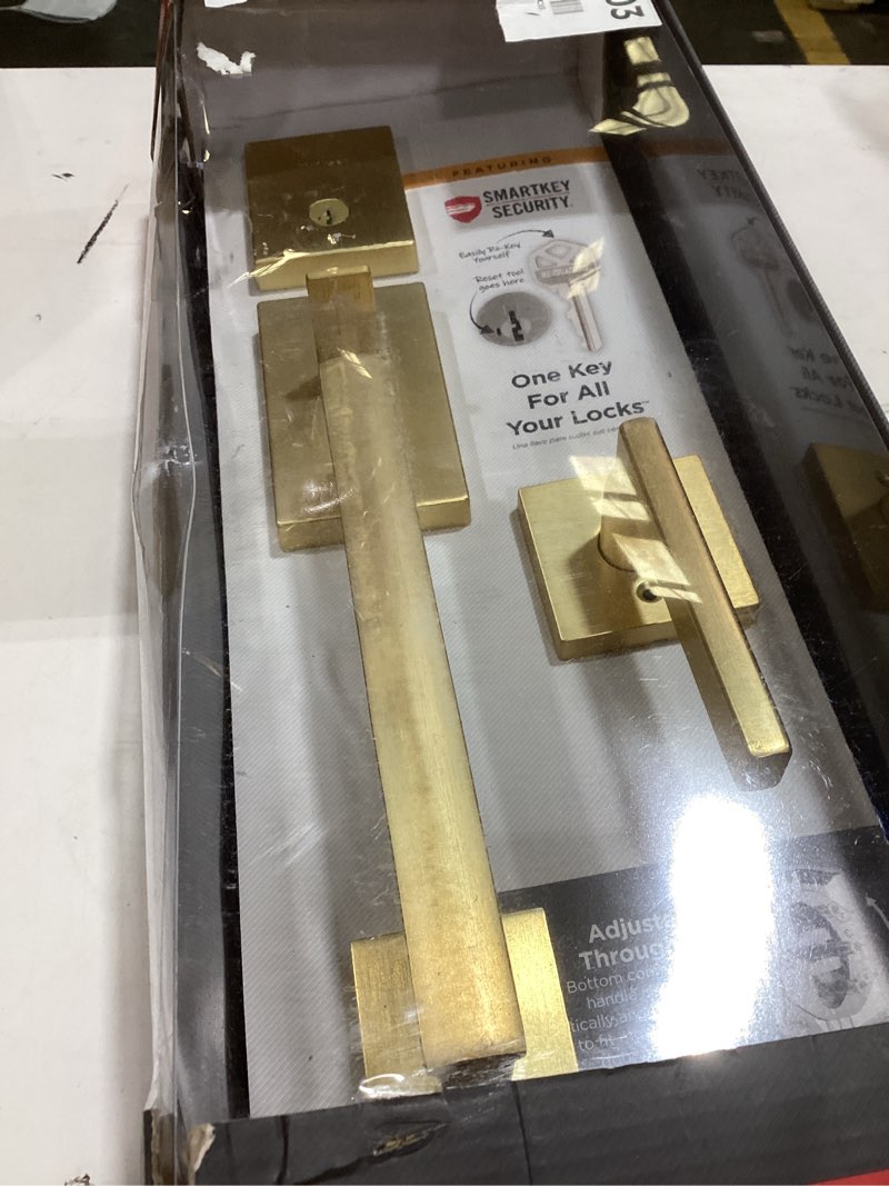 Condition photo showing As Is for kwikset san clemente front door lock handle and deadbolt set, entry handleset exterior with interior reversible lever, satin brass, pick resistant smartkey deadbolt security, with microban protection satin brass with handle keyed entry