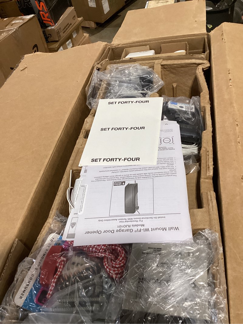 Condition photo showing New/Like New for chamberlain rjo101mc ultra-quiet wall mount garage door opener with battery backup, myq smart wi-fi 