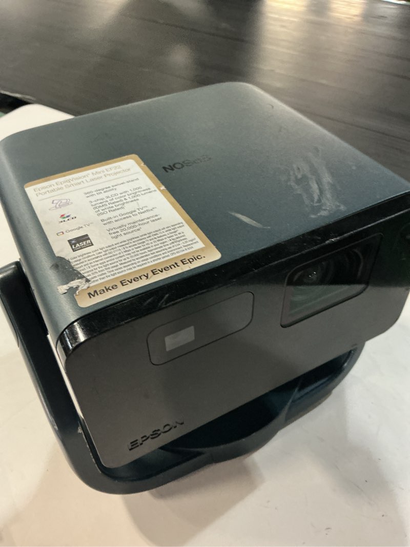Condition photo showing As Is for 360-degree swivel-stand with tilt ability 3-chip 3lcd with 1,000 lumens of color brightness (idms rated) & 1,000 lumens of white brightness (iso rated)' built-in google tv™2 with access to netflix®3 virtually maintenance- free 20,000-hour laser light source