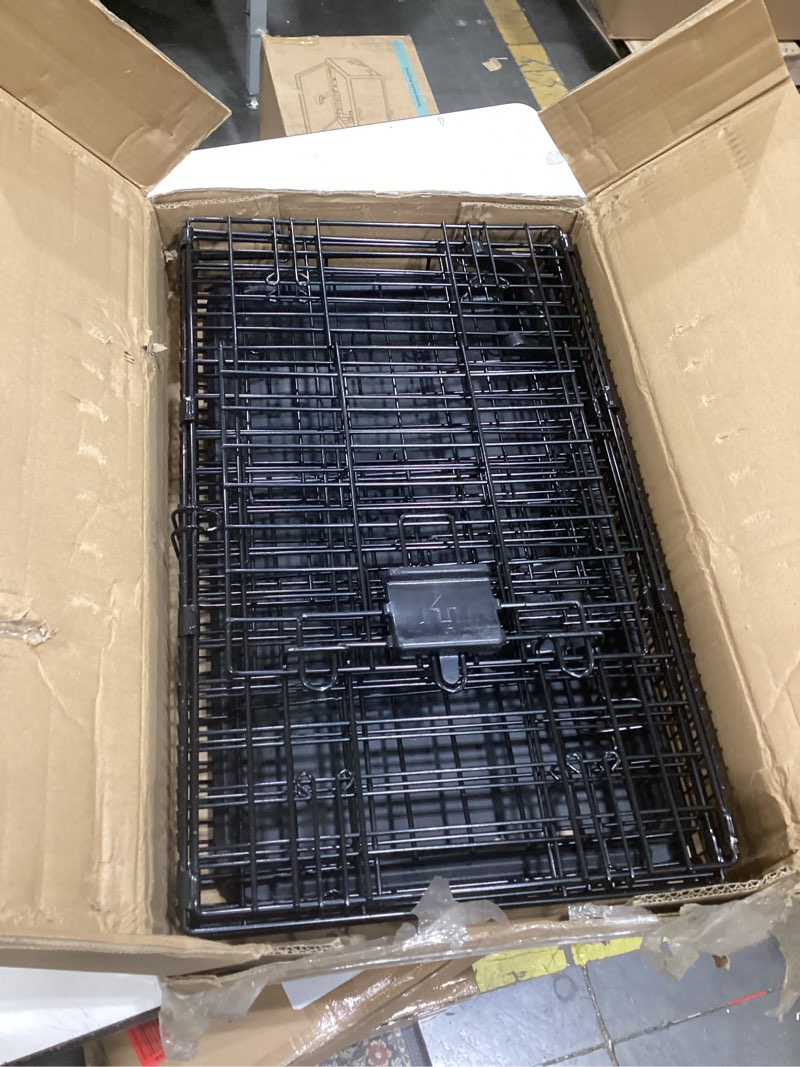 Condition photo showing Good Condition for amazon basics portable, foldable metal wire dog crate with removable tray, double door, divider panel, easy to assemble, 22 x 13 x 16 in, black 22.0"l x 13.0"w x 16.0"h double door w/ divider