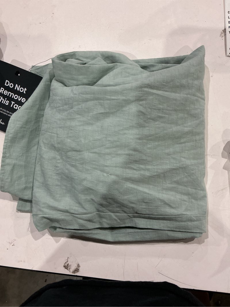 Condition photo showing Good Condition for breezy sophistication sage green textured wide-leg jumpsuit
