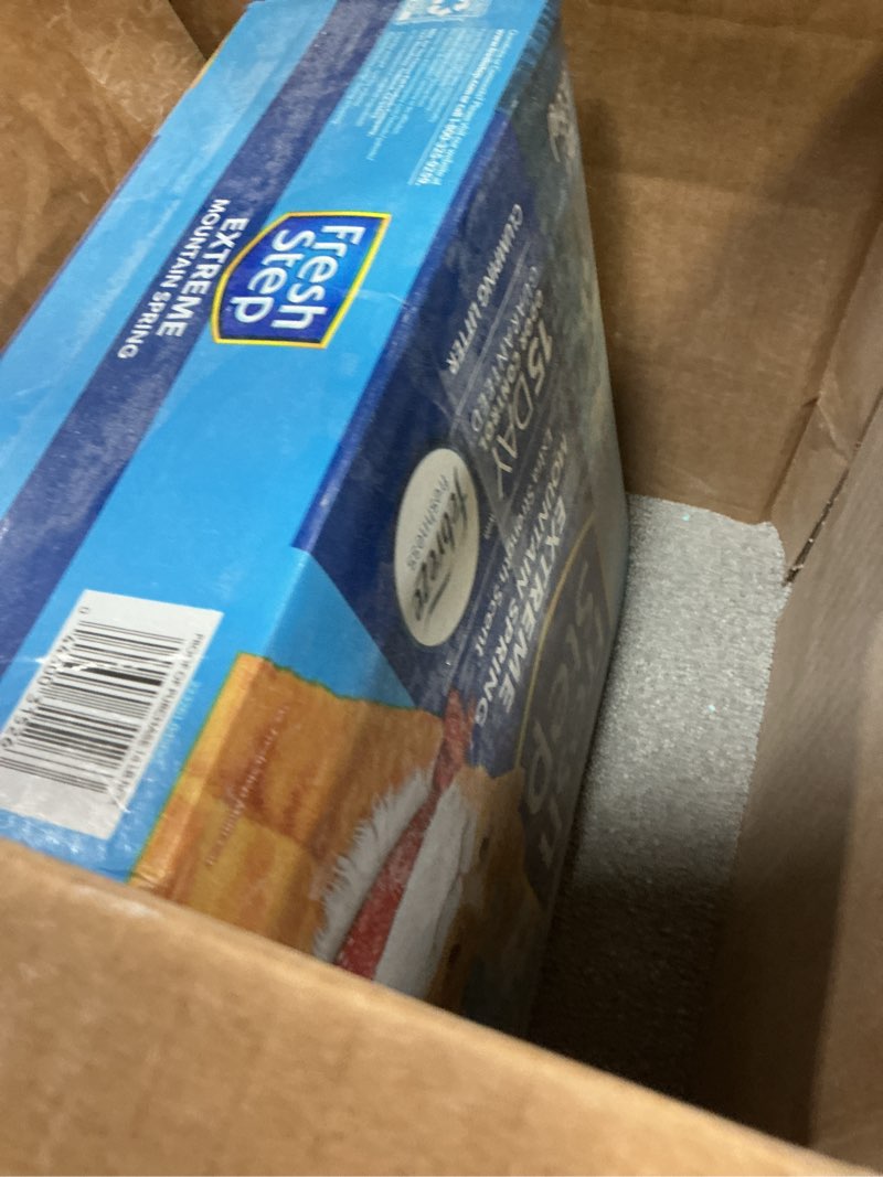 Condition photo showing As Is for Fresh Step Extreme Clumping Litter With Febreze Freshness, Mountain Spring Scent Clumping Cat Litter With Guaranteed Odor Control, 14 lb. Box Mountain Spring 14 lb