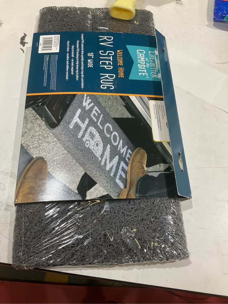 Condition photo showing Good Condition for camco life is better at the campsite camper/rv wrap around step rug - easy clean material w/”welcome home” design - no tools required - fits 18” (w) steps - works w/manual or electric steps (53196) 1\" x 1\" (rectangular)