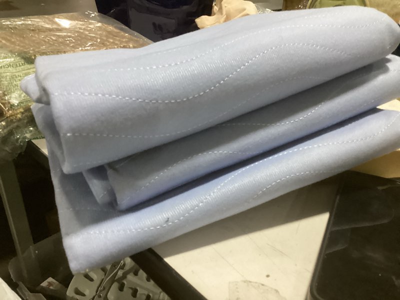 Condition photo showing As Is for **incomplete** (missing 1 pad) utopia bedding washable underpads 34\" x 36\" (pack of 4), waterproof reusable heavy absorbency incontinence bed pads for adults, kids, elderly and pets, bedwetting pads for sofa and couch (blue) 34x36 inch (pack of 4) blue