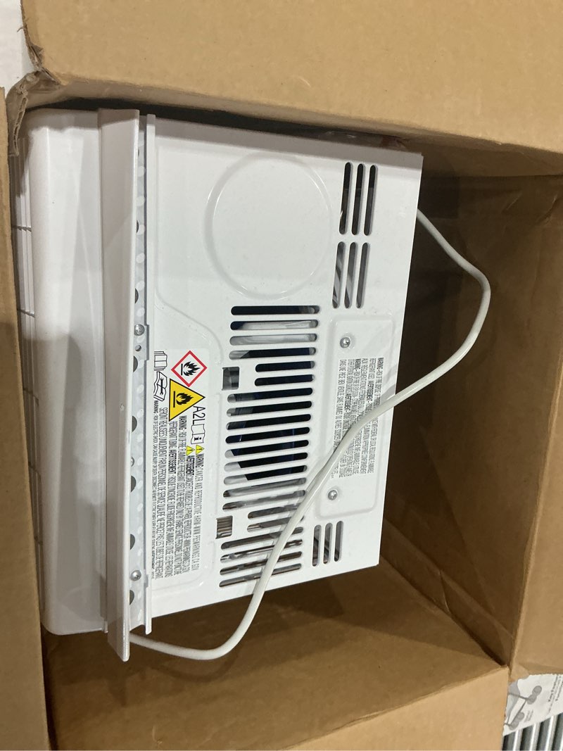 Condition photo showing As Is for amazon basics 5000-btu small window air conditioner, up to 150 sqf, window ac units with cool and fan functions, washable filter, adjustable window kit, intuitive mechanical controls, white white 5000 btu