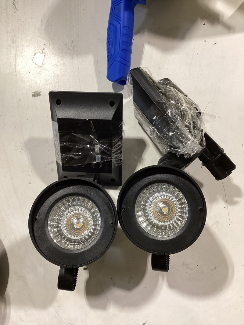 Condition photo showing As Is for harbor breeze 183 -lumens black warm white solar led flood light