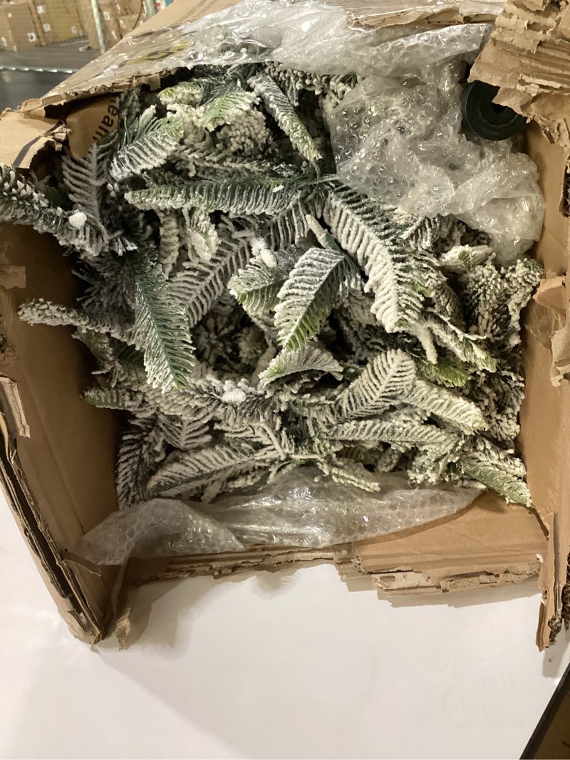 Condition photo showing New/Like New for Puleo International 7.5ft Pre-Lit Flocked Aspen Fir Christmas Tree with 700 Clear Lights, 1319 Realistic Dense Snow Flocked Branch Tips, Easy Setup Artificial Trees with Sturdy Metal Stand 7.5' Flocked Aspen Fir with 700 Clear Lights