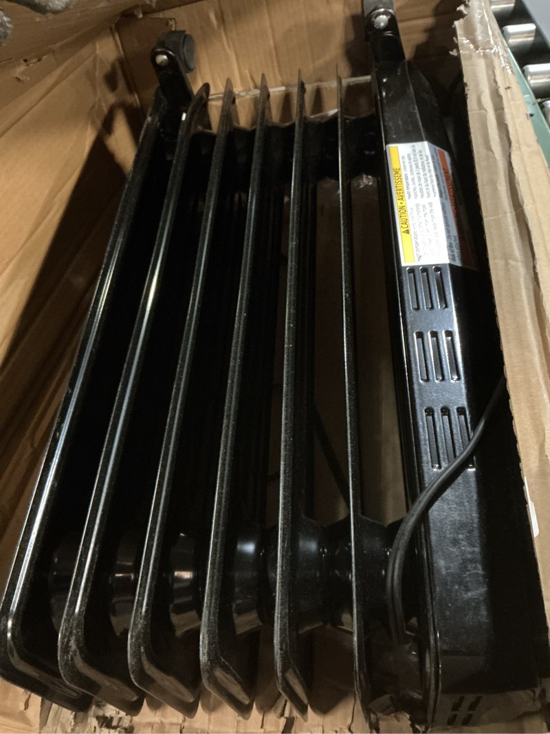 Condition photo showing As Is for Amazon Basics Portable Oil Radiator Heater for Indoor Use, 3 Heat Settings, Over-Heat Protection, ETL-certified Safety, 7 Oil-Filled Steel Fins, 1500W, 11"D x 14.8"W x 25.2"H, Black