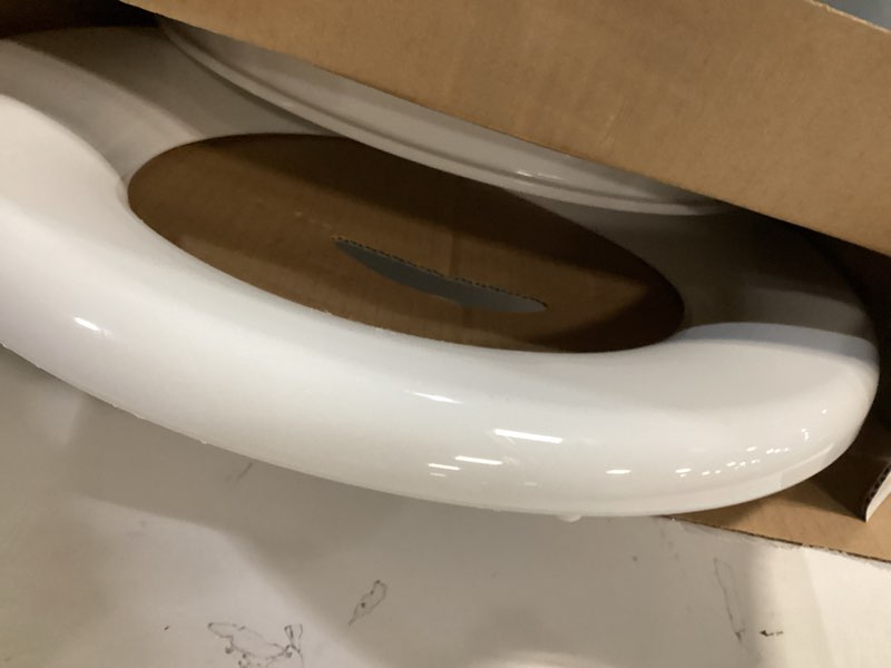 Condition photo showing As Is for KOHLER 20111-0 Brevia, Slow Close Toilet Seat, Round Toilet Seat, Grip-Tight Bumpers Quick-Attach Hardware, White White Round Quiet-Close