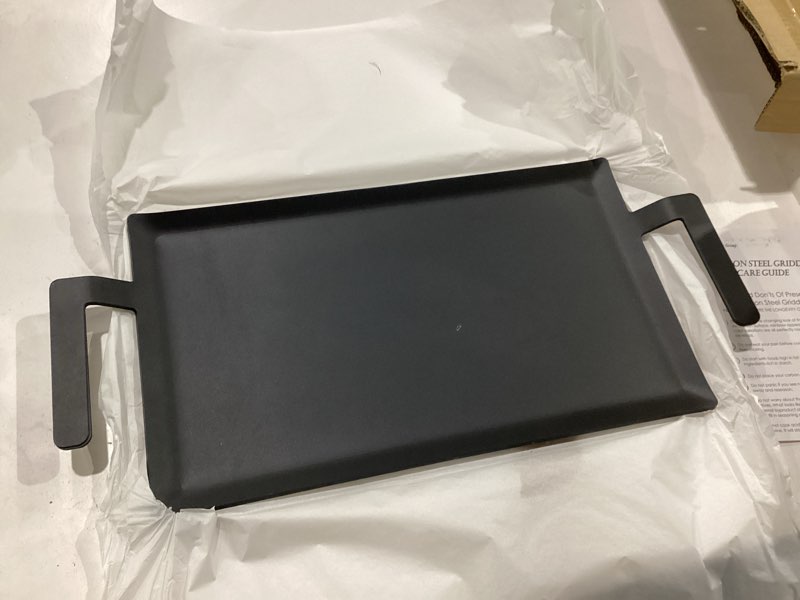 Condition photo showing New/Like New for universal large carbon steel griddle for outdoor gas grill, induction, gas/electric stove, and oven, double burner griddle comes with grill press, pre-seasoned nitride coating process large(comes with grill press)