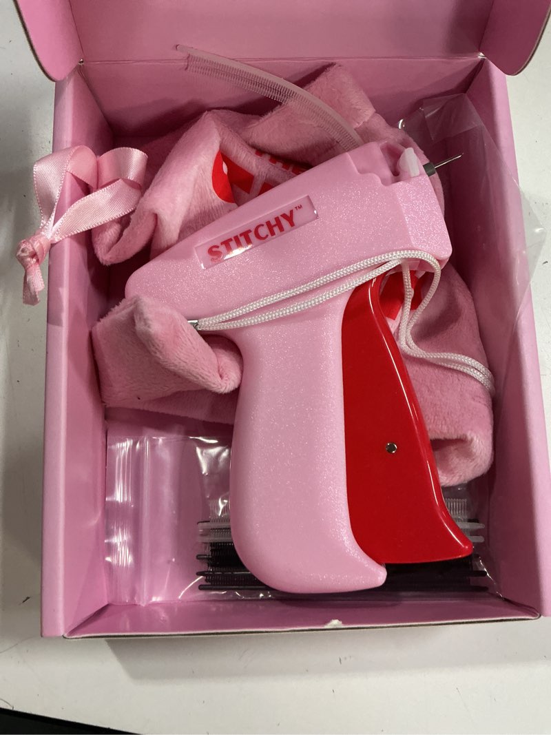 Condition photo showing Good Condition for stitchy no-sew hemming tool- easy, portable, professional-grade tagging gun for quick, temporary hems on pants, skirts, dresses, and sleeves