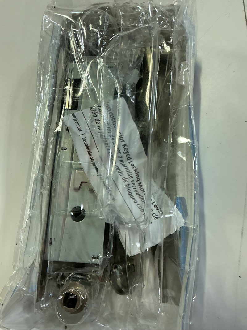 Condition photo showing As Is for serenade mortise keyed lever mount latch with deadbolt for screen and storm doors, satin nickel