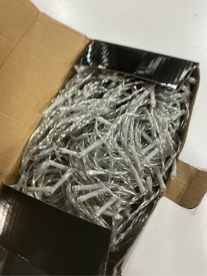 Condition photo showing Good Condition for Solhice LED Curtain Lights Outdoor 40ft x10ft, 800 LED Plug in Hanging String Lights Indoor, Twinkle Lights Backdrop for Outside Backyard Patio Wedding Décor, Warm White (Not Connectable) Warm White 40ft x 10ft