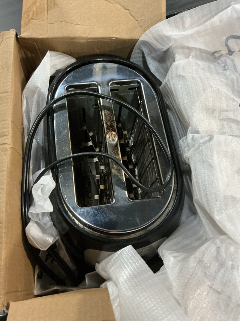 Condition photo showing As Is for black+decker 2-slice toaster, tr1278bd, extra wide slots, 7 shade settings, 850 watts, frozen and bagel buttons compact black