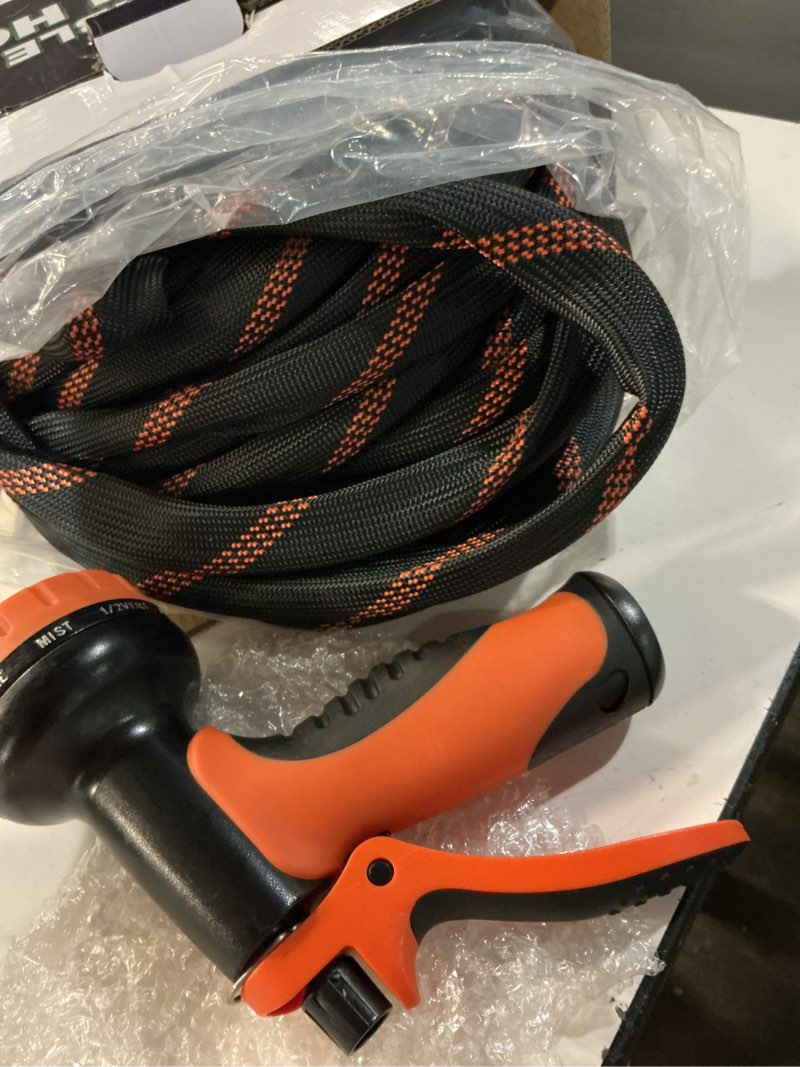 Condition photo showing Good Condition for flexible garden hose 50 ft, ultra lightweight water hoses w/10 function sprayer and 3/4" brass fittings, kink-free, sturdy, abrasion resistant for yard, lawn, outdoor and gardening(black orange) 50ft black orange