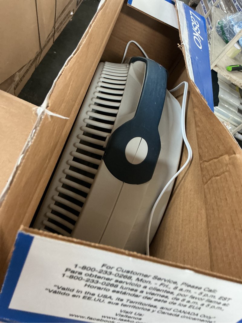 Condition photo showing As Is for lasko wind machine 23.38 in. h x 20 in. d 3 speed floor fan