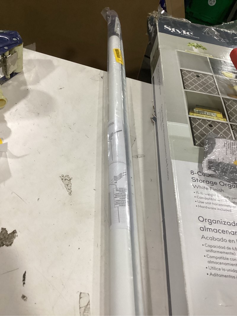 Condition photo showing As Is for levolor 55-in x 78-in white room darkening cordless roller shade