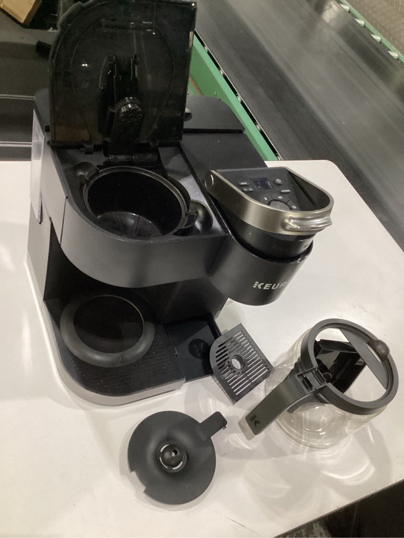 Condition photo showing As Is for Keurig K-Duo Single Serve K-Cup Pod & Carafe Coffee Maker, with Multiple Brew Sizes, 60oz Removable Reservoir, Programmable Auto Brew Carafe, (Gen 1), Black, USED, DAMAGED 