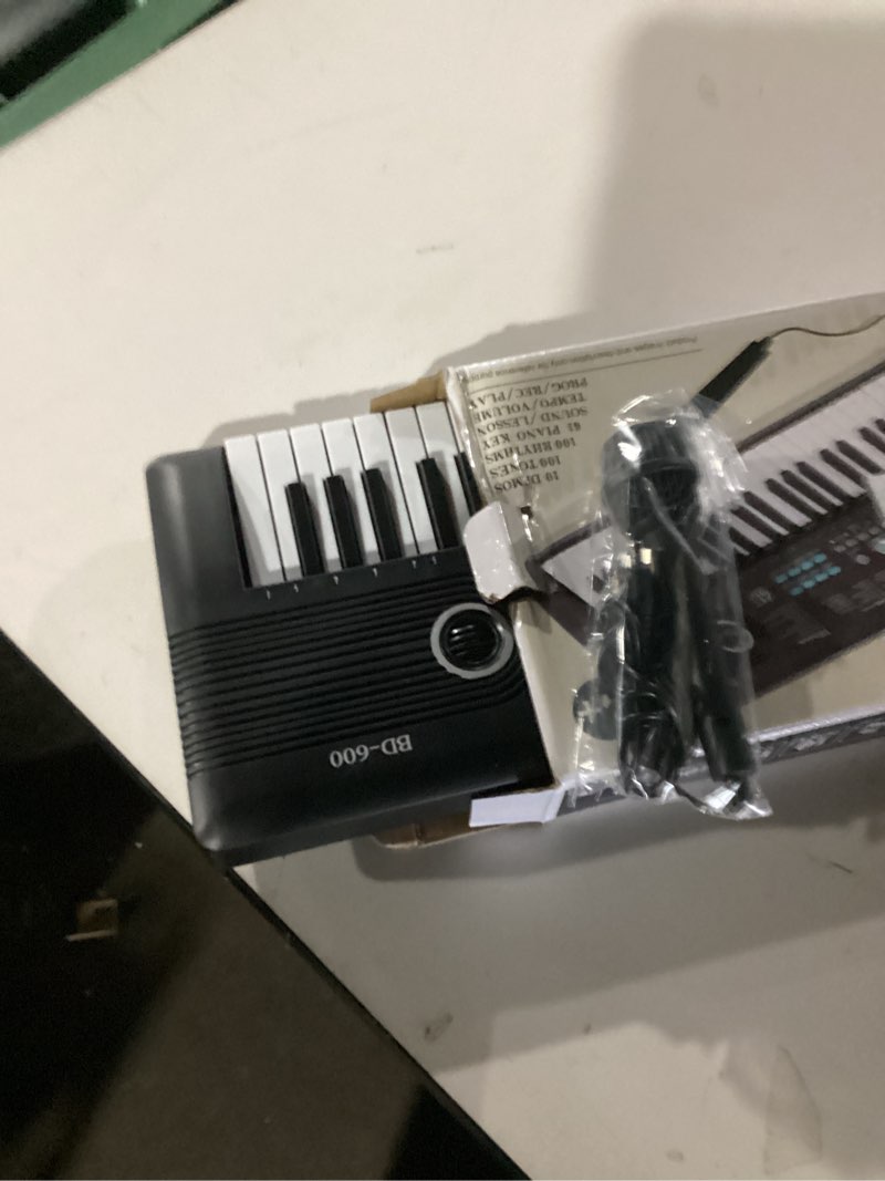 Condition photo showing New/Like New for 61 keys keyboard piano, Electronic Digital Piano with Built-In Speaker Microphone, Portable Keyboard Gift Teaching for Beginners, electric piano for kids Black