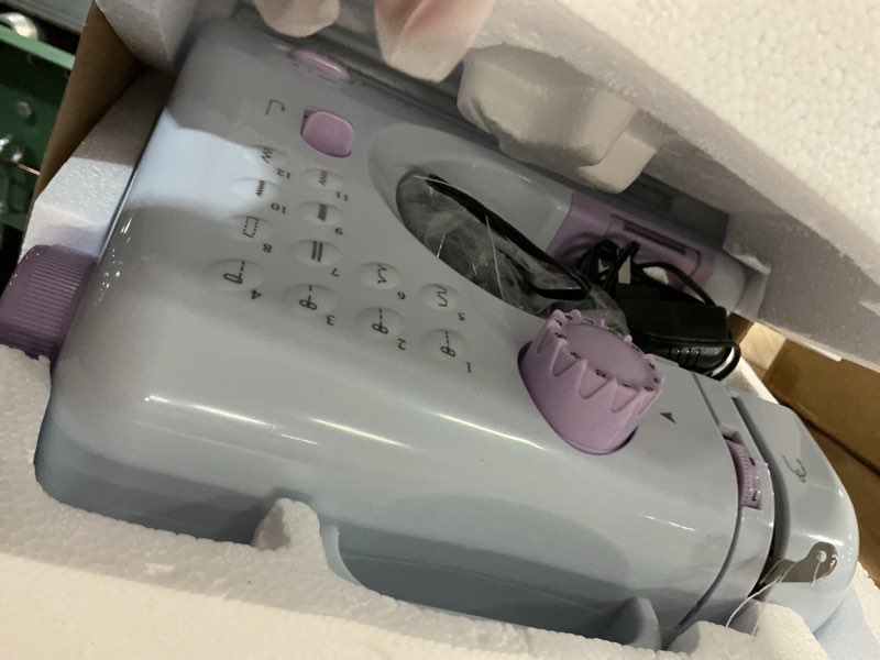 Condition photo showing Good Condition for havvix portable mini electric sewing machine for beginners with 12 built-in stitches, 2 speed with foot pedal, led light, and storage drawer?purple+white? purpel