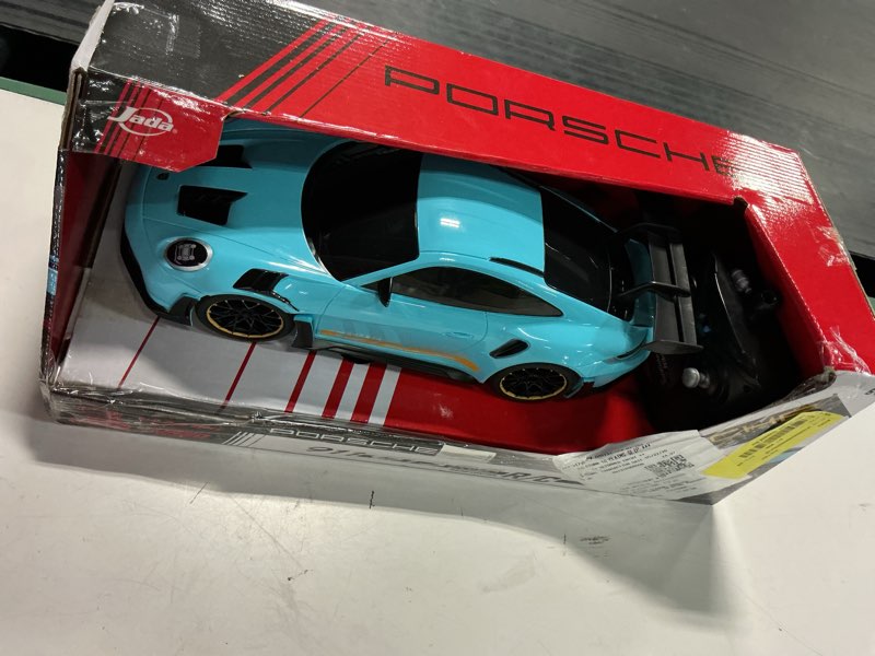 Condition photo showing As Is for jada toys porsche 911 (992) gt3 rs – 1:16 rc – usb rechargeable with turbo function, radio control cars(blue)