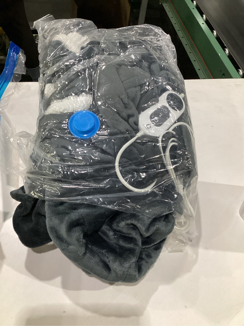Condition photo showing As Is for Westinghouse Electric  Snuggle Throw Blankets with Foot Pocket, Wearable Heated Blanket with Sleeves, 6 Heating Levels & 2 to 10 Hours Heating Time Settings,  Heated Snuggle Blanket Grey, SIMILAR TO STOCK PHOTOS