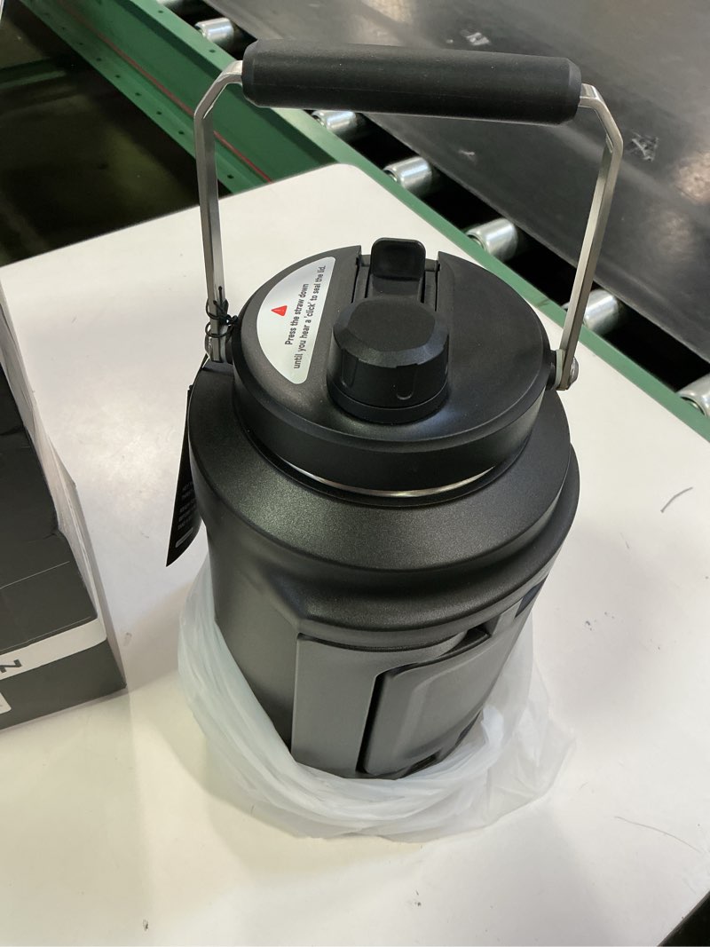 Condition photo showing New/Like New for 1 Gallon Insulated Water Bottle for Travel: 2-in-1 Straw Spout Lid, Dual Handle, Leakproof, Keep Cold 48H, 128oz Stainless Steel Water Jug for Gym, Biking, Road Trip, Work, Home, Picnic (Midnight) Midnight 128 Ounces