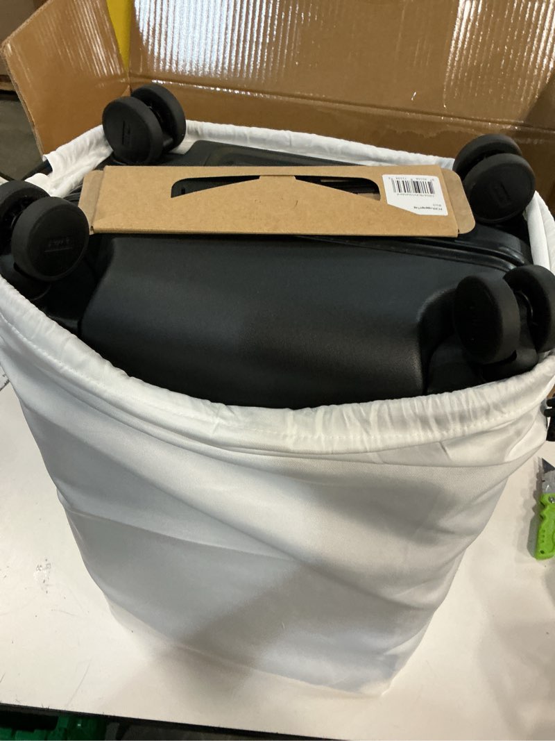 Condition photo showing New/Like New for Away Carry-On Luggage, Lightweight Hardside Suitcase with Spinner Wheels, 22 Inch Airline Approved, TSA Lock, Jet Black