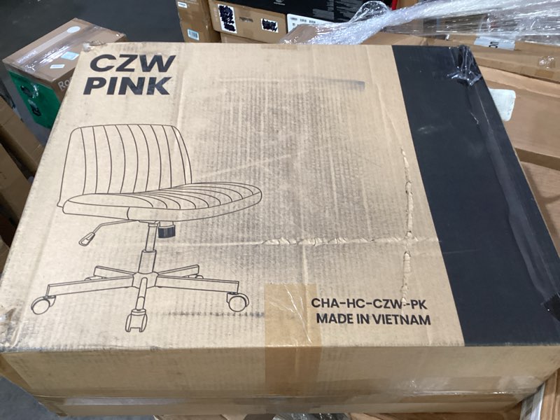 Condition photo showing As Is for orange factory criss cross chair, wide fabric vanity desk seat, pink wheel | cross-legged with 360° swivel, height adjustable, smooth and silent wheels, comfy seating for office, desk, or computer use