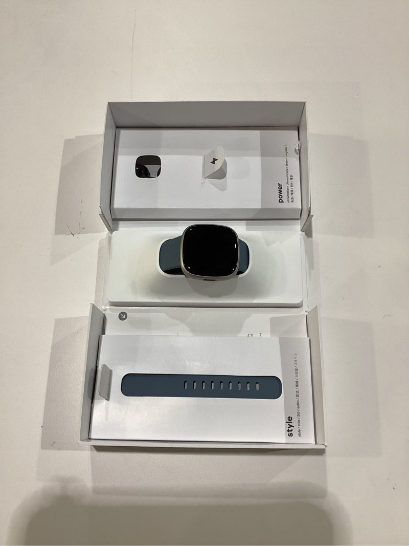 Condition photo showing New/Like New for Fitbit Versa 4 Fitness Smartwatch with Daily Readiness, GPS, 24/7 Heart Rate, 40+ Exercise Modes, Sleep Tracking and more, Waterfall Blue/Platinum, One Size (S & L Bands Included)