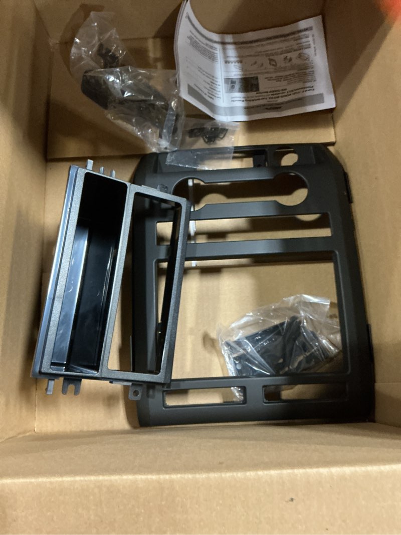 Condition photo showing Good Condition for Metra Electronics 99-5822B Single DIN Installation Dash Kit for 2009-2010 Ford F-150 Non-NAV Models with Driver Info Switches in Factory Panel(Matte Black) Kit Standard Packaging