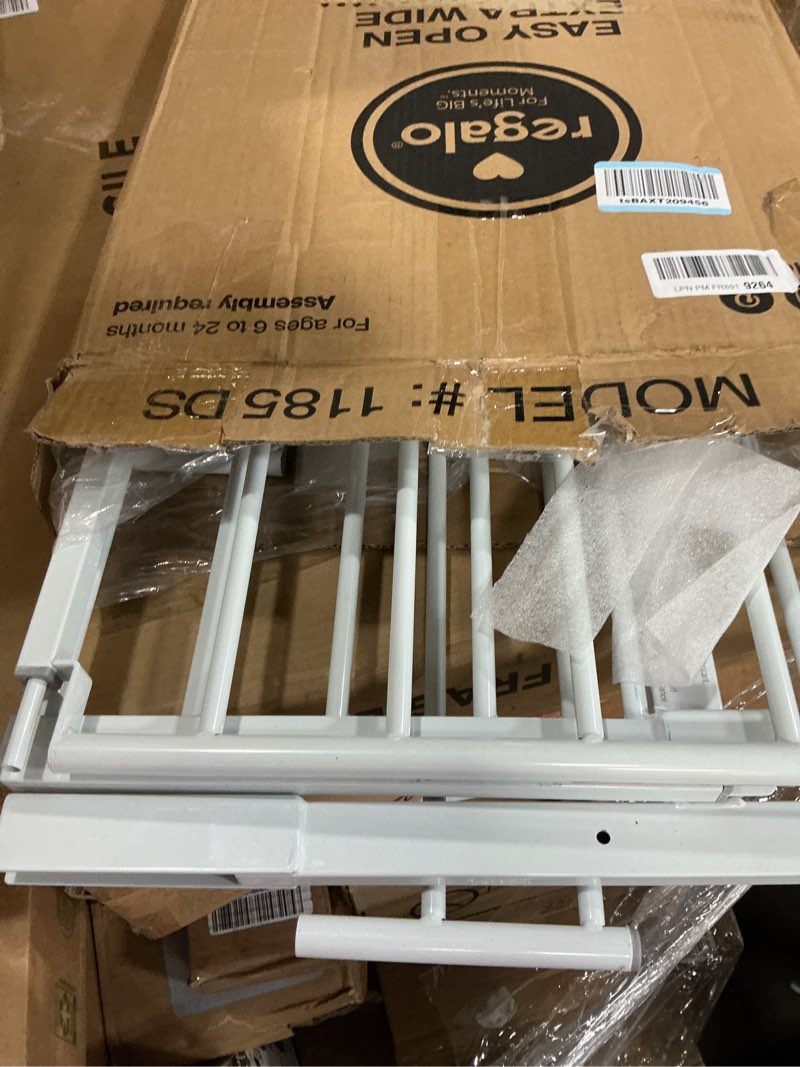 Condition photo showing Good Condition for Regalo Safety Easy Open 47-Inch Extra Wide Baby Gate for Doorways, Hallways & Bottom of Stairs, Pressure Mount Safety Gate for Babies, Toddlers & Pets, Tested & Safe, American Designed, Family Owned Metal Gate
