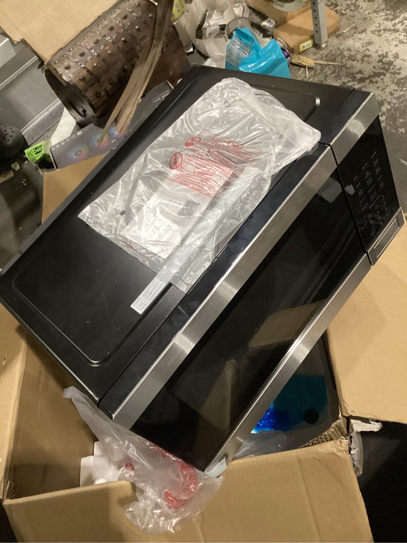 Condition photo showing New/Like New for not tested ge gcst10a1wss 1.0 cu ft convection microwave oven, 1050w countertop air fry microwave with broil & crisper pan, compact stainless steel design