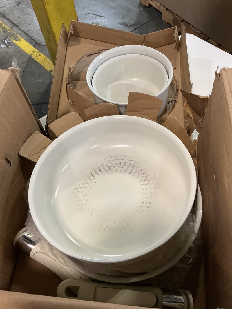 Condition photo showing As Is for Amazon Basics Ceramic Nonstick Pots and Pans Set with Detachable handle, 11-Piece Stackable set, All Cooktop Friendly, Includes Saucepan, Frying pan, Ivory