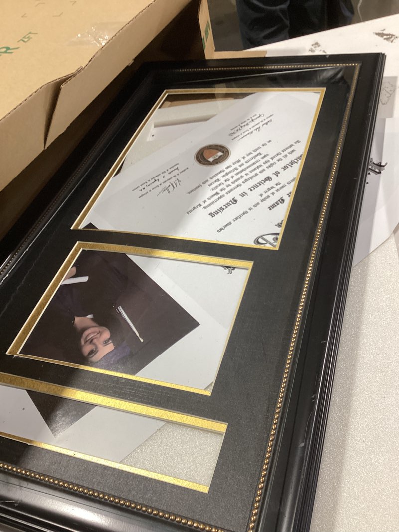 Condition photo showing As Is for GraduatePro Picture Frame - Black Frame with Gold Rim, 11x22 inches, Document/Certificate & 5x7 Photo, Double Mat, Real Glass, Tassel Holder, Vintage Collection Black Frame - Black Over Gold 11x22