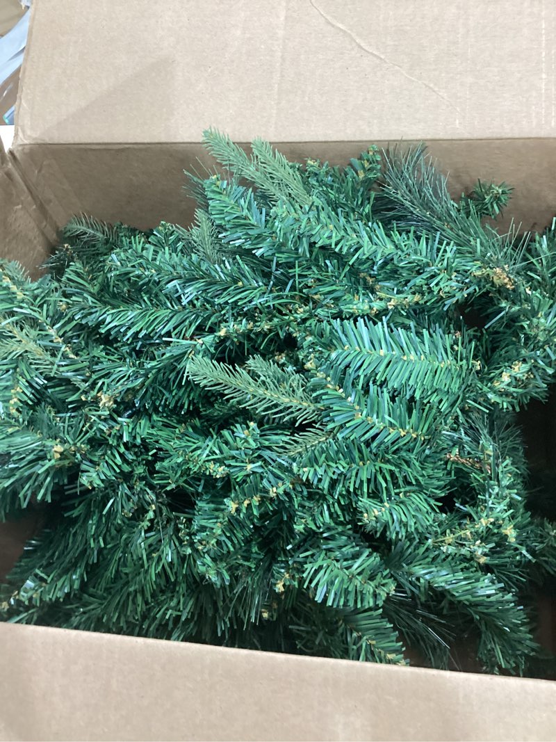 Condition photo showing item condition for KING BIRD Pre-lit Christmas Garland, 9 FT by 12 Inch, Classic Green Christmas Garland with 50 Warm Lights 300 Branch Tips for Christmas Cg-05-25