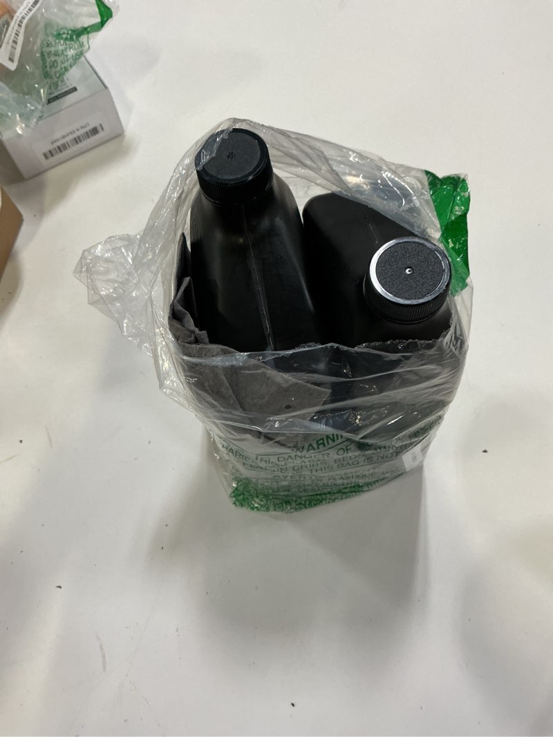 Condition photo showing Good Condition for (oil bottles only)generac 5w-20 full synthetic oil change bundle with oil, filter, funnel, and absorbent pad (4 items)