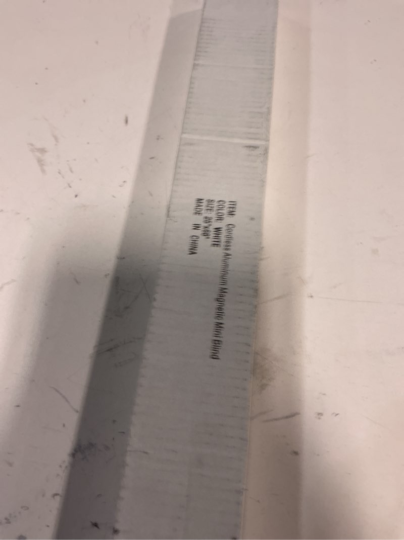 Condition photo showing New/Like New for comfy hour 25" w x 68" l cordless magnetic blinds for metal doors, white aluminum slats window shade, light filtering home decor for steel door, no drill easy installation 25"w x 68"h