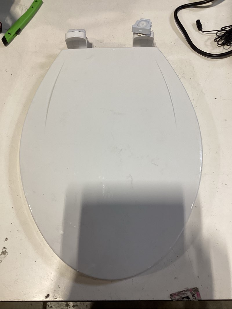 Condition photo showing As Is for american standard 5503b00b.020 transitional slow-close round front toilet seat, white modern