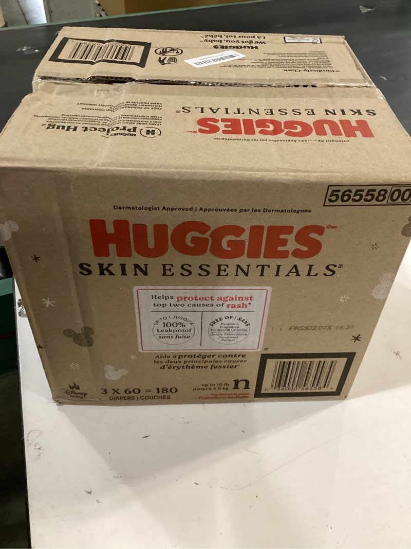 Condition photo showing New/Like New for Huggies Size Newborn Diapers, Skin Essentials Baby Diapers, Size Newborn (6-9 lbs), 180 Count (3 Packs of 60), Packaging May Vary Newborn 180