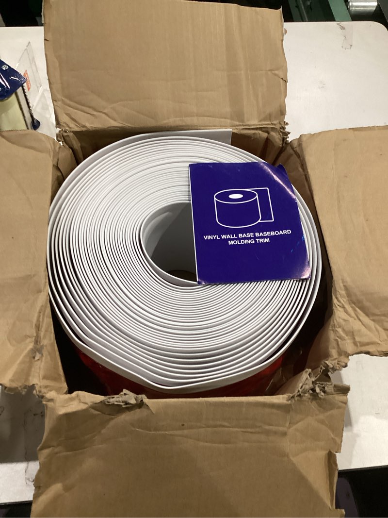 Condition photo showing Good Condition for Vinyl Baseboard Molding Trim 6 Inch x 60 Feet Peel and Stick Baseboard Trim Flexible PVC Cove Base Moulding Self-Adhesive Trim for Garage Bathroom Cabinet Floor Walls, White 6Inch x 60Ft White