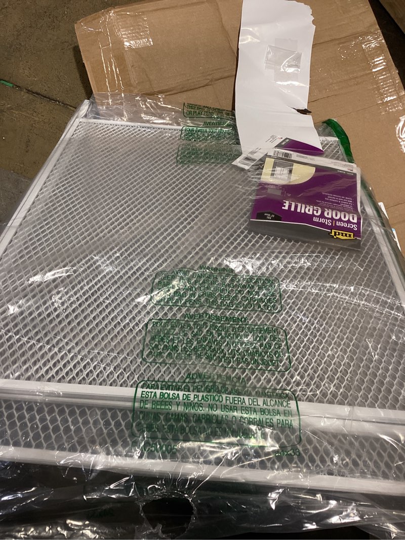 Condition photo showing Good Condition for m-d building products 33308 20 in. x 32 in. white aluminum screen storm door grille 32\" white