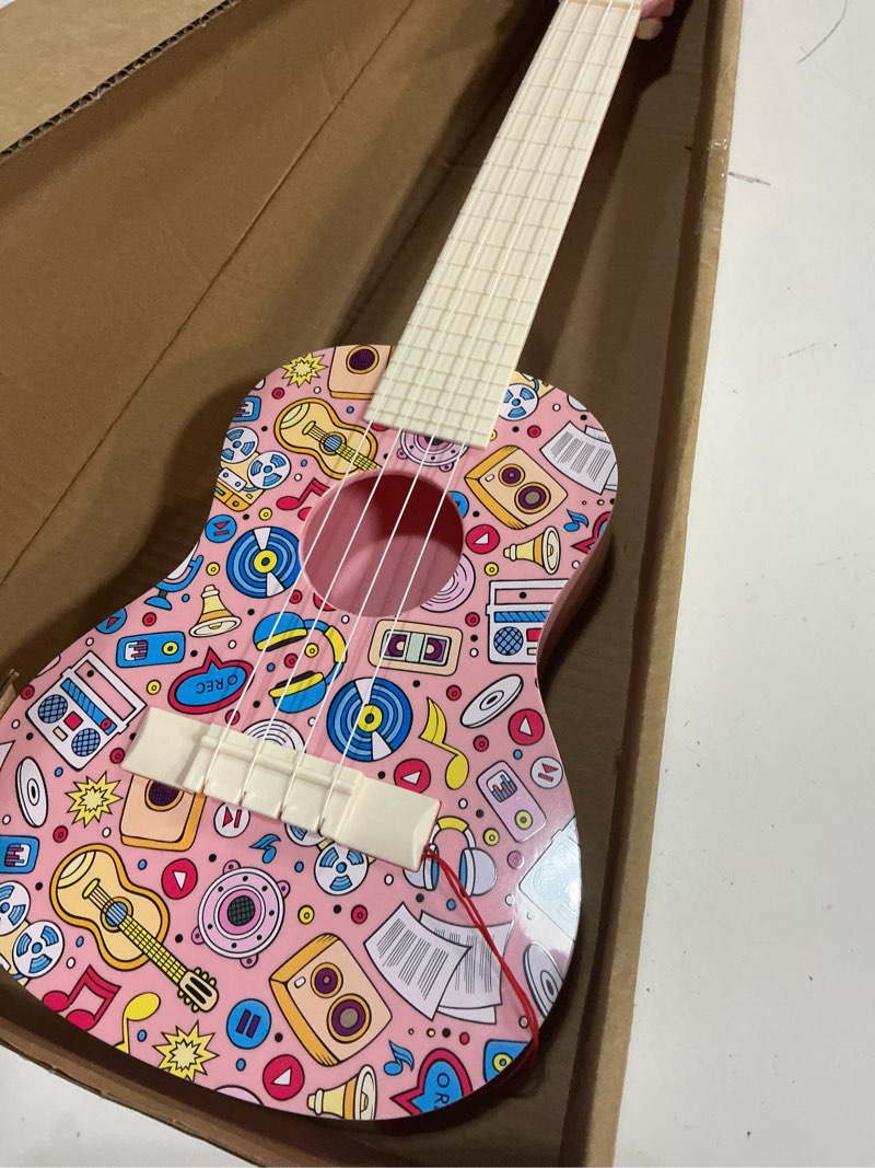 Condition photo showing Good Condition for LeeQee 21in Colorful Graffiti Ukulele Guitar for Kids, 4 Strings Kids Guitar Ukulele Musical Instruments Learning Educational Toys with Picks for 3 4 5 6 7 8 9 10 11 12 Toddler Boys Girls (Pink)