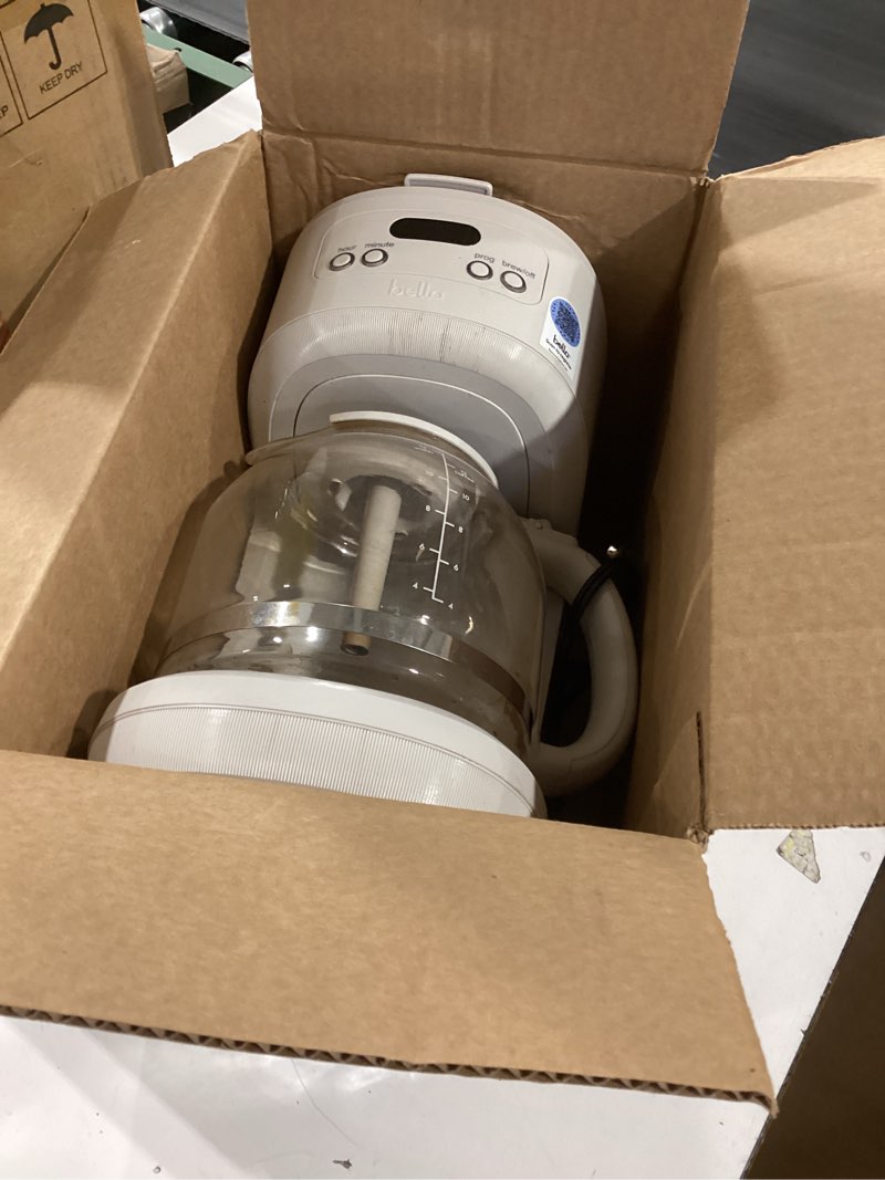 Condition photo showing As Is for bella 12 cup programmable coffee marker, reusable dishwasher safe accessories, easy lcd diaply, auto shutoff, 900 watt, oatmilk