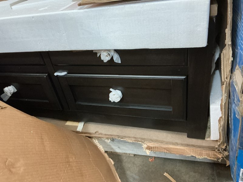 Condition photo showing item condition for Signature Design by Ashley Drazmine Casual Lift-Top Coffee Table with 4 Drawers and Casters, Dark Brown & Light Brown