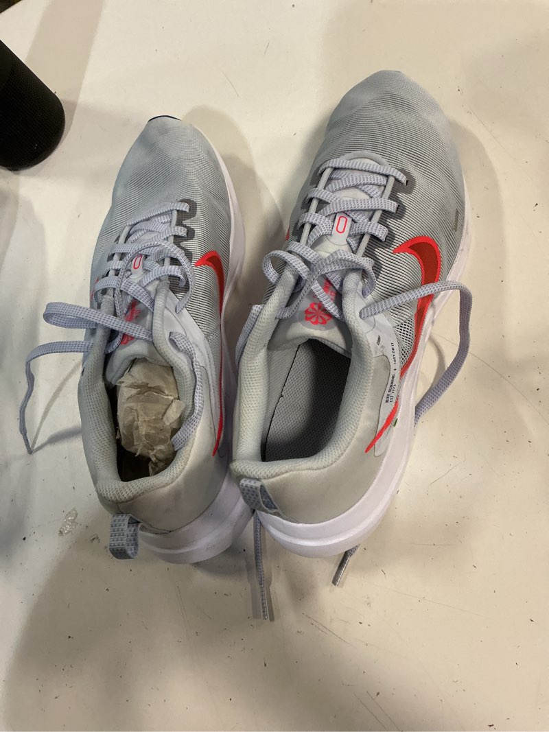 Condition photo showing As Is for size 11.5- nike downshifter grey red
